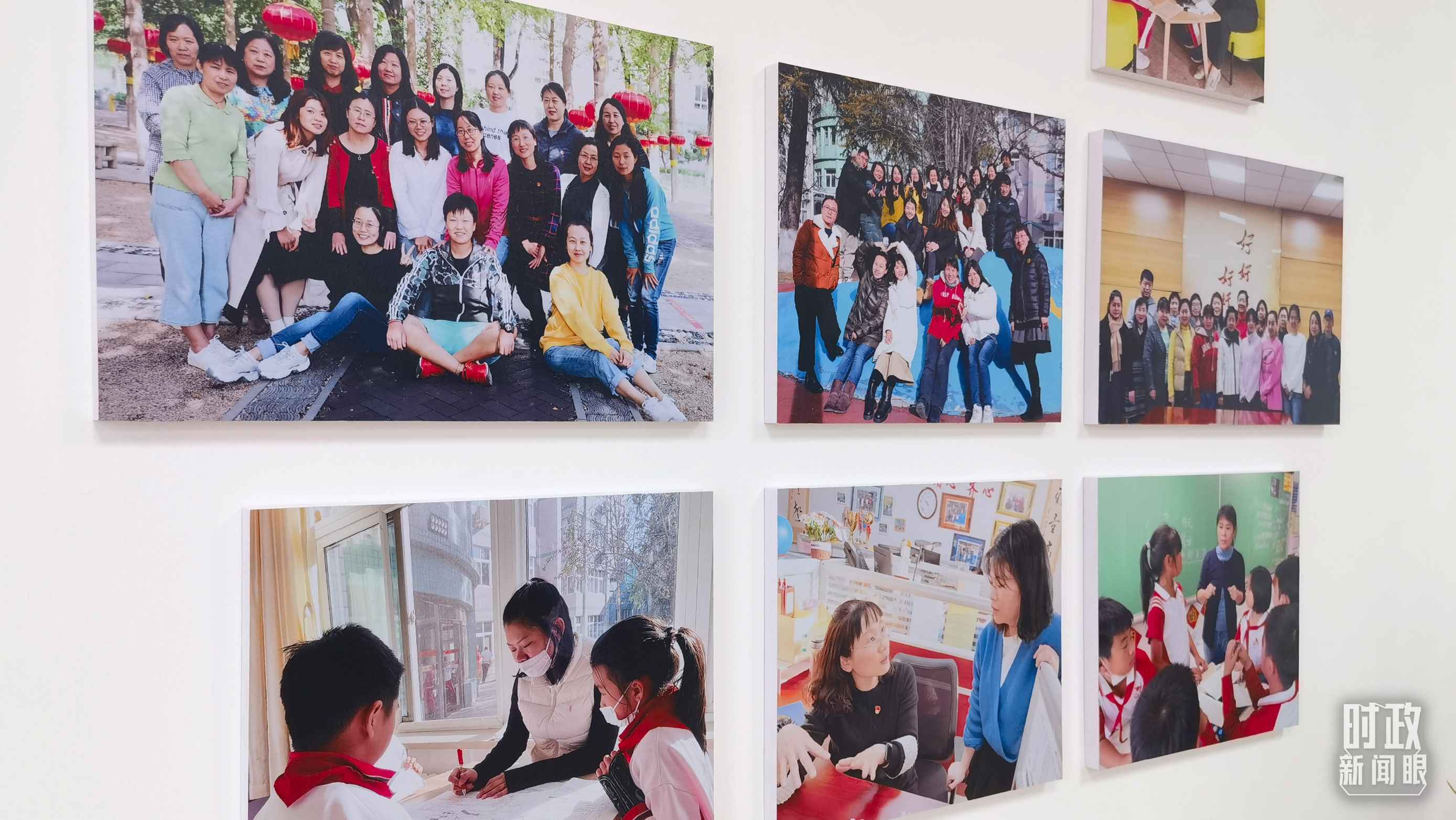 △五年級教師辦公室內(nèi)的合影展板。（總臺央視記者賈林拍攝）