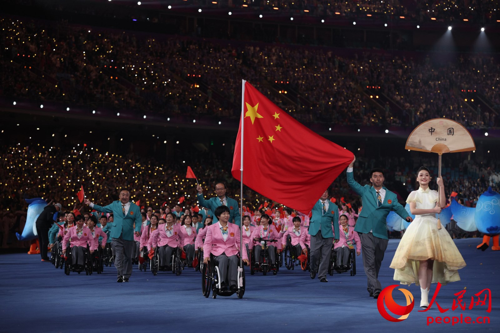開幕式上，中國體育代表團入場。人民網(wǎng) 周靜圓攝