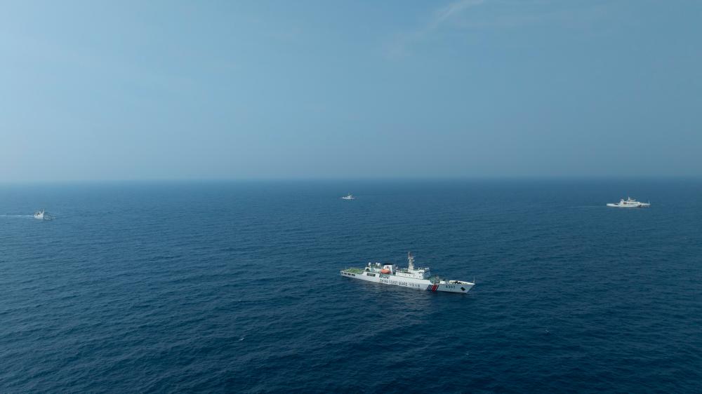 4月22日，中越海警艦艇編隊(duì)在北部灣海域開展聯(lián)合巡邏。（中國(guó)海警供圖）